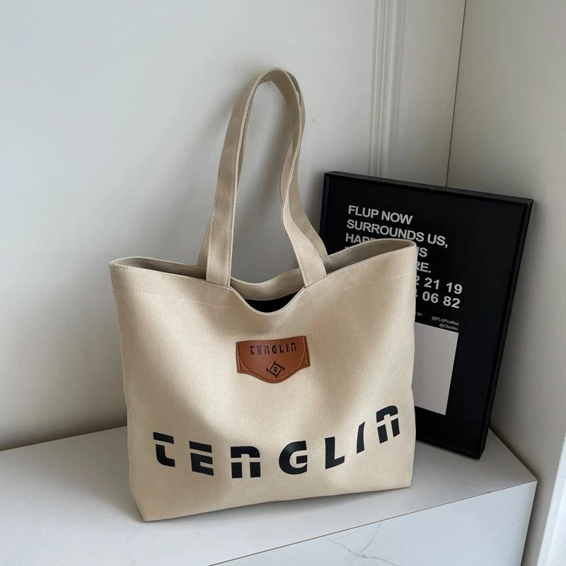 Women's shoulder bag printed letter large capacity monochromatic stitching line casual bag