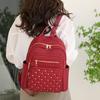 Solid Color Diamond Grid Car Stitching Rivet Fashionable Backpack with Women's Texture, Large Capacity, Simple Backpack