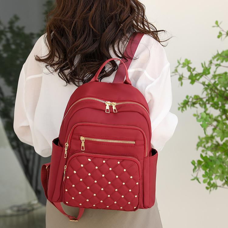 Solid Color Diamond Grid Car Stitching Rivet Fashionable Backpack with Women's Texture, Large Capacity, Simple Backpack
