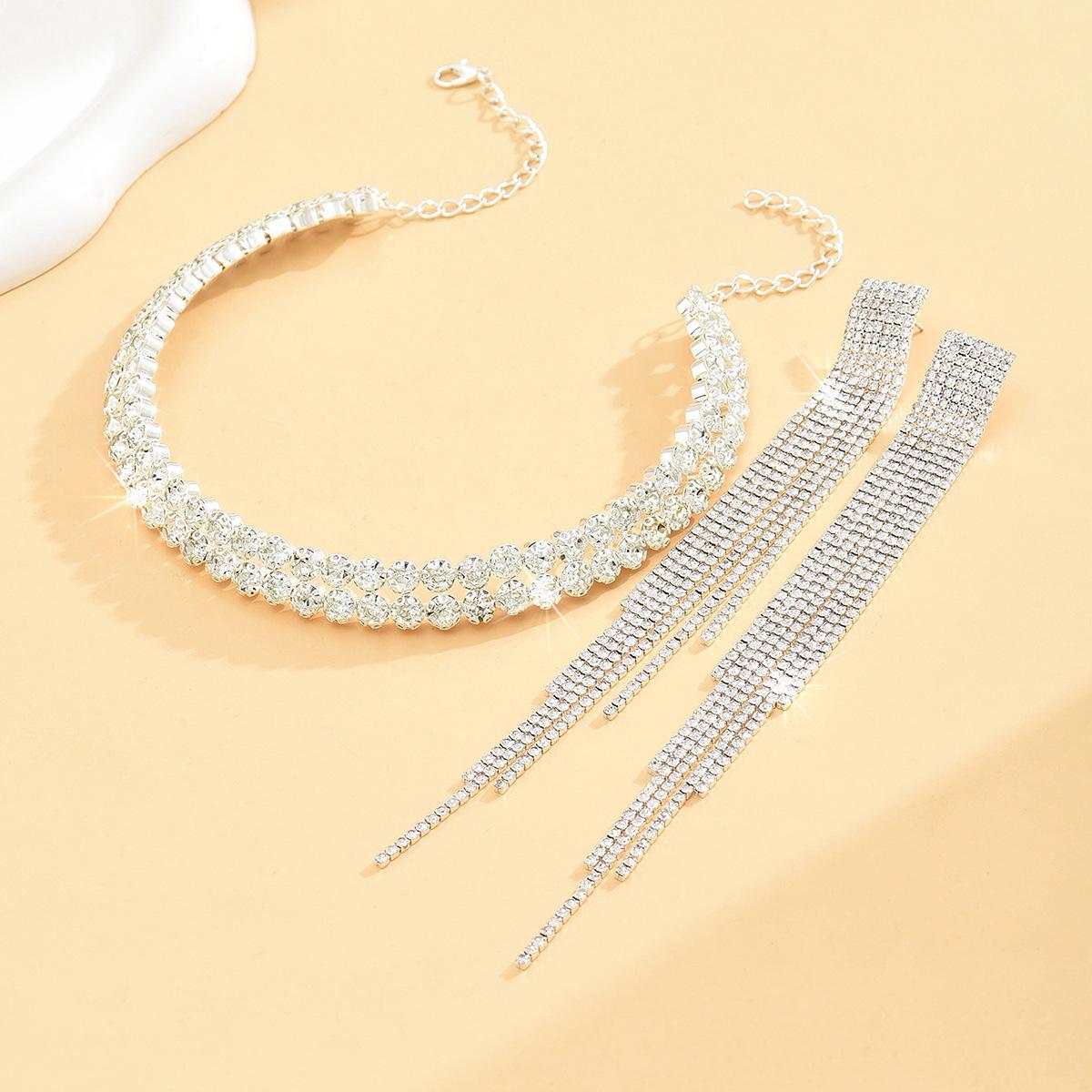 

Комплект ювелирных изделий Свадебные аксессуары Премиум-колье Серьги Двухкомпонентное свадебное платье Универсальные аксессуары Комплект ювелирных изделий Цепочка