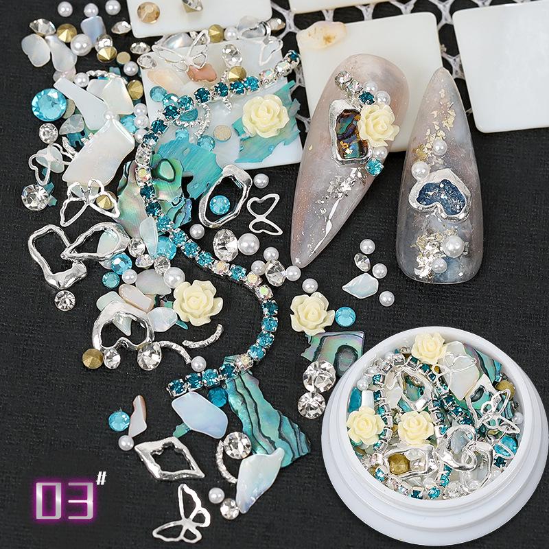 Dolphin Bay Nail Art: Shell Pieces, Rhinestones, Pearls, and Metal Chains Mixed Decorations