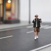 Miniature Figure Standing with Backpack Painted Scale Model Person for