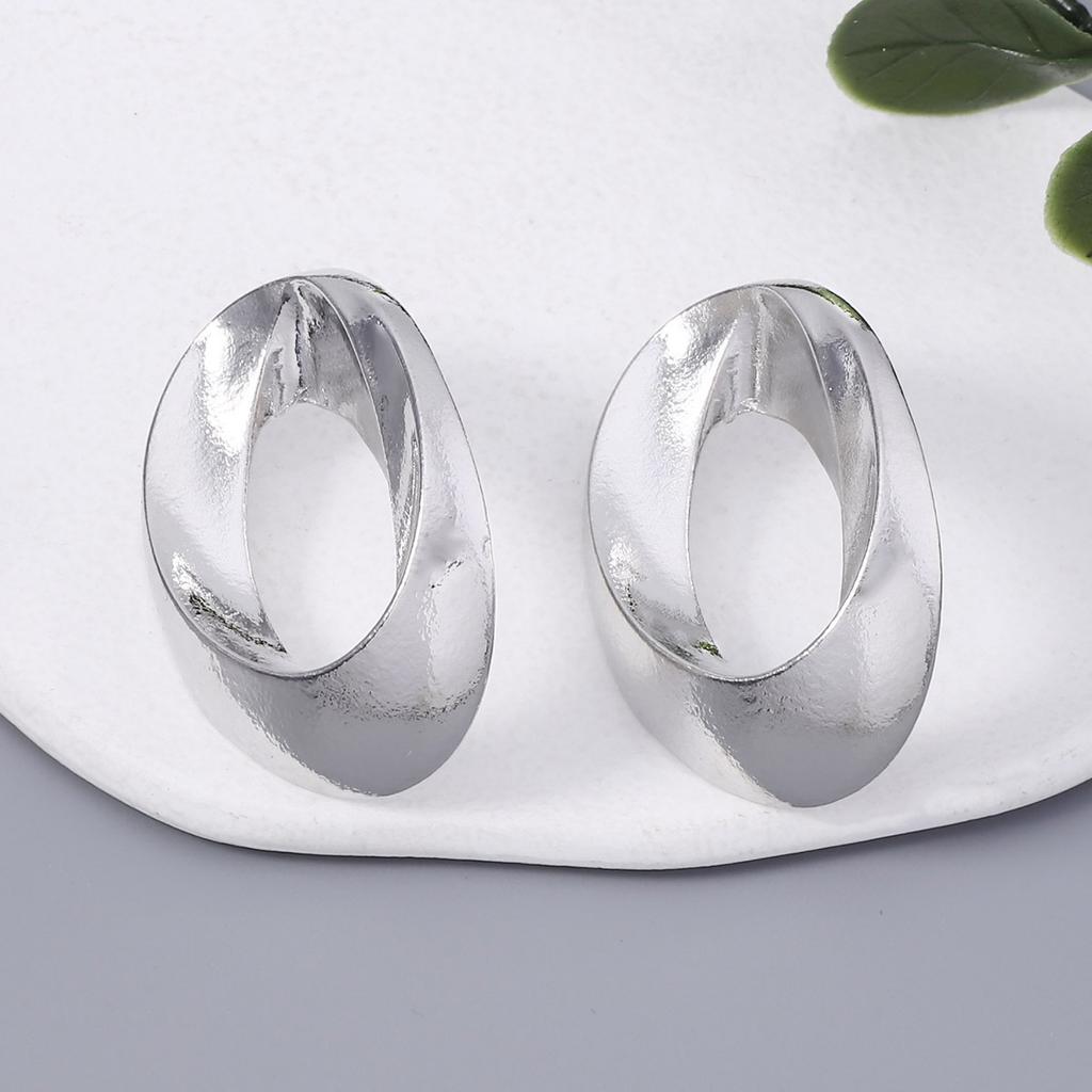 Geometric Circular Hollowed-out Elliptical Metal-textured Earrings for Both Men and Women, with a Cold and Simple Style for Couples