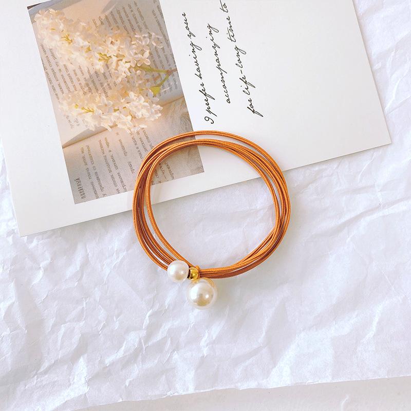 Elegant Korean Pearl Knot Hair Tie - High Elasticity Rubber Band Accessory.