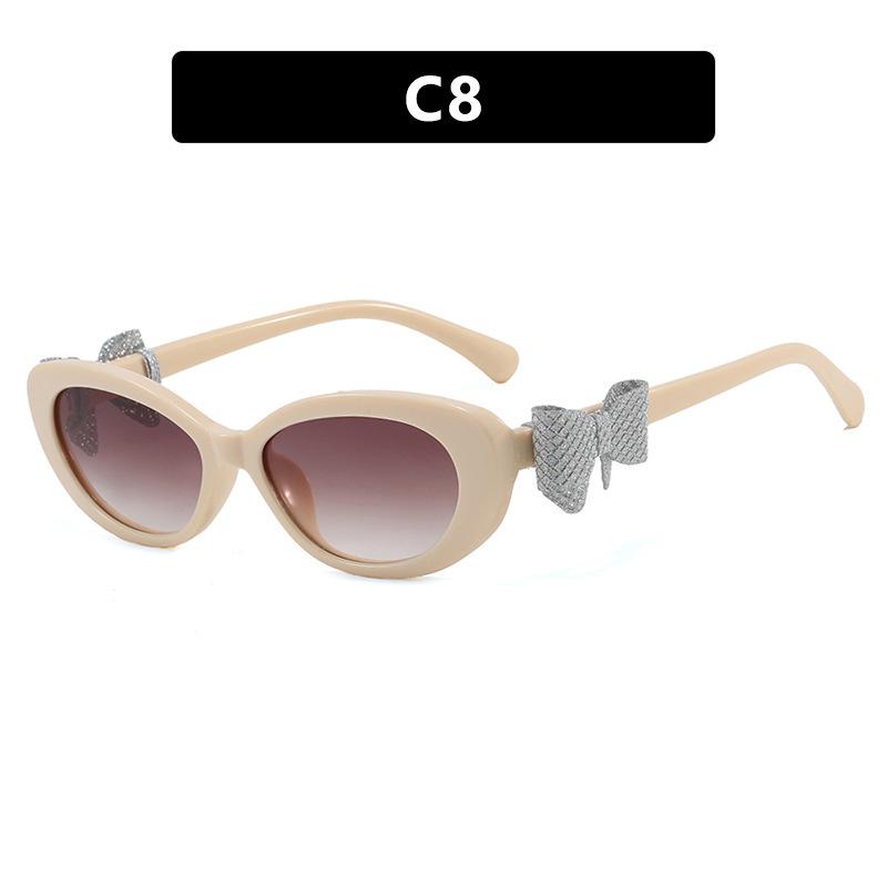 Fashion cat eye sunglasses bow decorative sunglasses women's high-end street photo UV-proof sunglasses