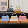 Spring new high-end texture trendy fashion portable small square bag niche versatile commuter messenger bag