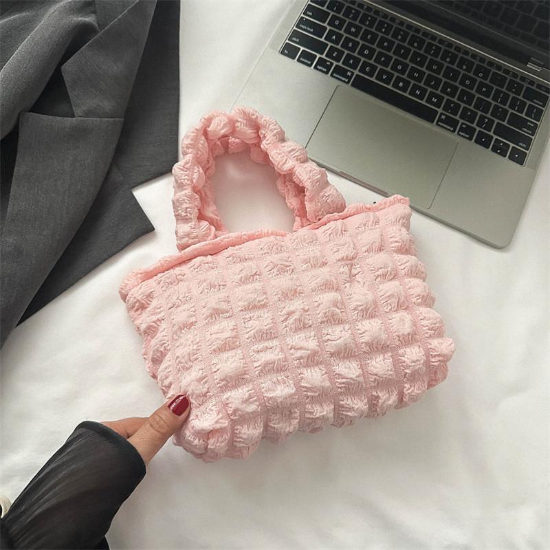 

Versatile Medium Soft Canvas Handbag For Women Featuring Unique Stitching Details рожевий