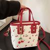 This Adorable and Sweet Cherry Print Handbag Features a Charm Detail and Is Perfect for Shopping, Commuting To Work, or Parties.