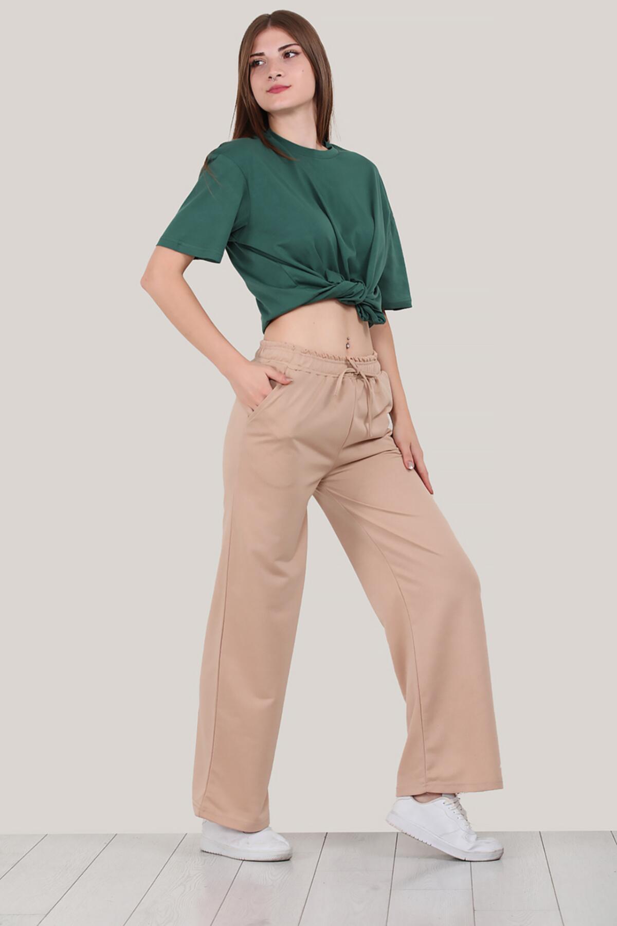 

Женские широкие спортивные штаны 36 бежевый