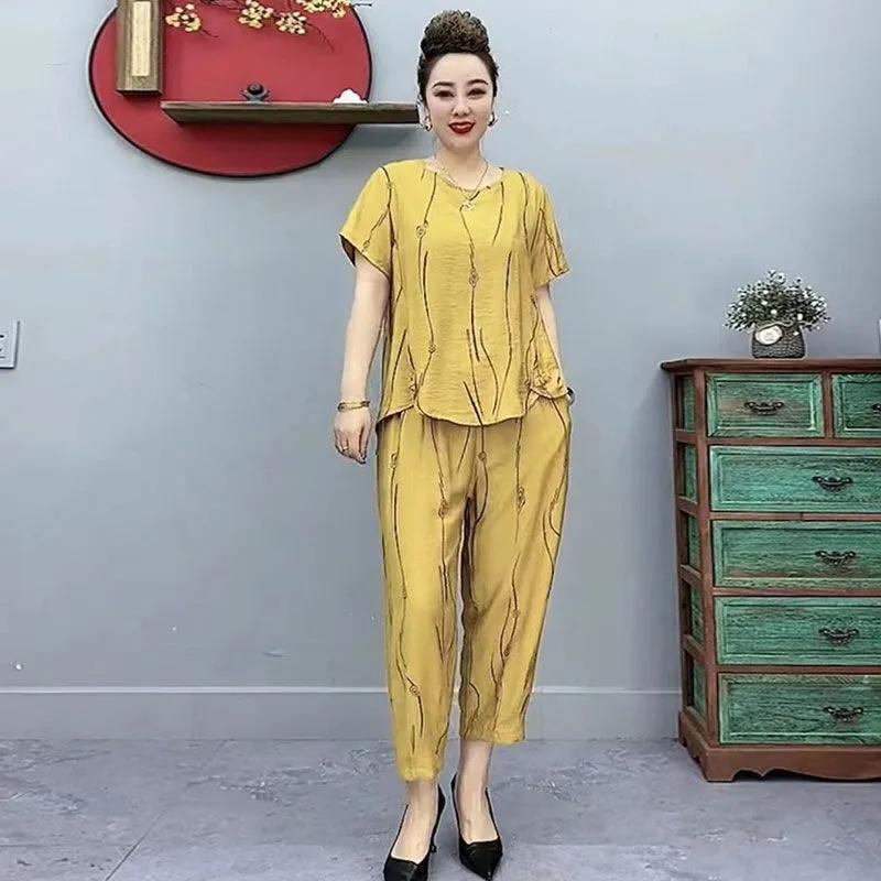 Letní bavlněné lněné obleky pro ženy středního věku Volné zahraniční trička s krátkým rukávem Módní ležérní oblečení pro matky středního věku