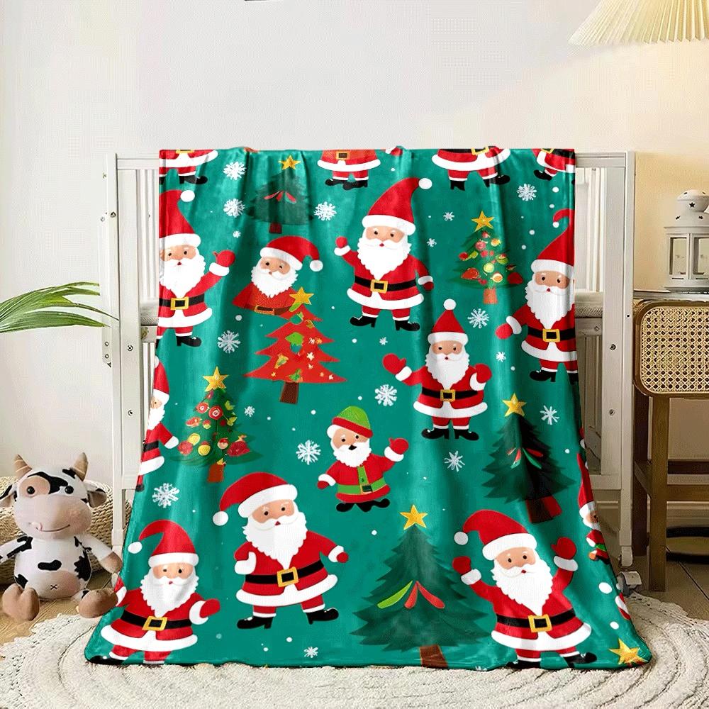 Santa Claus, Christmas trees, snowflakes, and ornaments on a green background. for all seasons blanket lunch break throw gift 80cm x 120cm