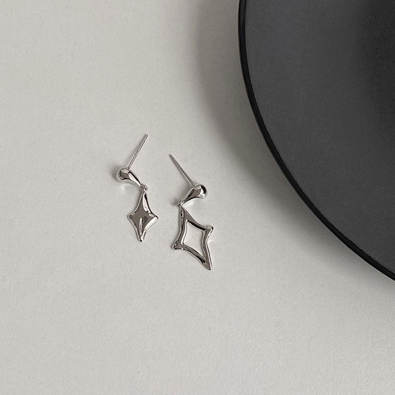 

Сережки День і ніч з чотирма променями Зірка на кожен день