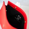 Red leather crossbody bag, with a golden chain shoulder strap, stylish logo shoulder bag
