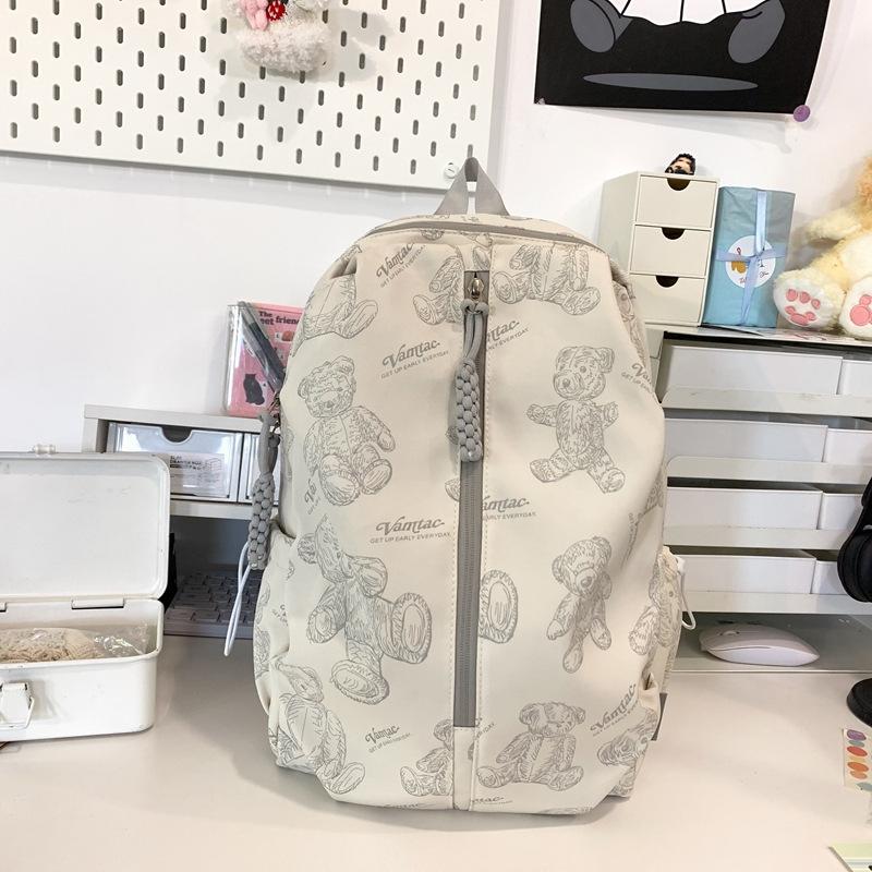 New nylon bear schoolbag female Korean version junior high school student student versatile lightweight simple travel backpack .