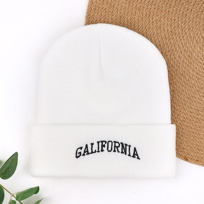Autumn and winter knitted hats men's cold hats new warm and cold-proof solid color women's mountain pullover wool hats