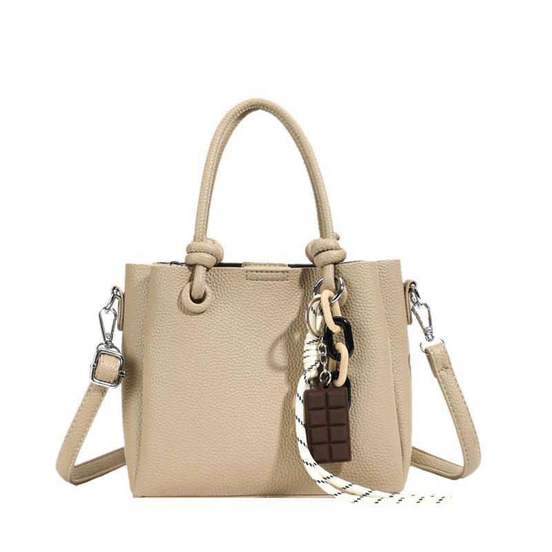 Wholesale Hot Sale Niche Simple Style Solid Color Portable Bucket Bag Commuting Versatile High-end Feeling Foreign Messenger Bag Woman