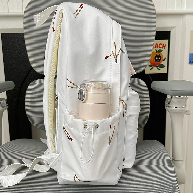 Matchstick Print Backpack for Women and Girls Fashion School Travel Daypack with Tassel Detail