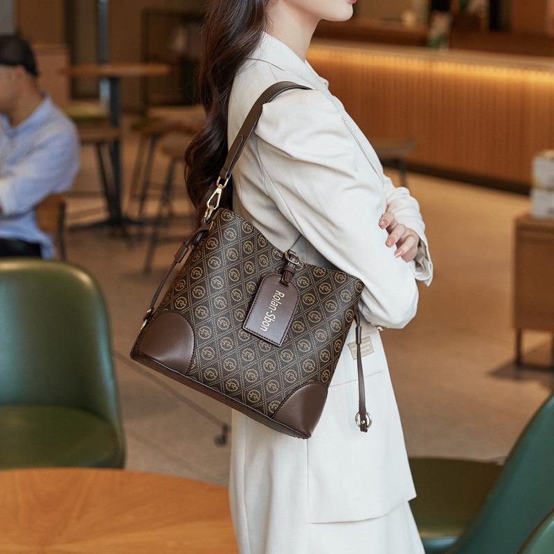 Vielseitige Nischen-Bucket-Bag Neue Einfache Schräge Satteltasche für Damen Große Kapazität Bedruckte Einzel-Schulter-Handtasche für Damen