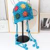 Handmade crocheted ear protection hat women's autumn and winter ethnic style colored flower knitted hat fringed strap ball bag head wool hat
