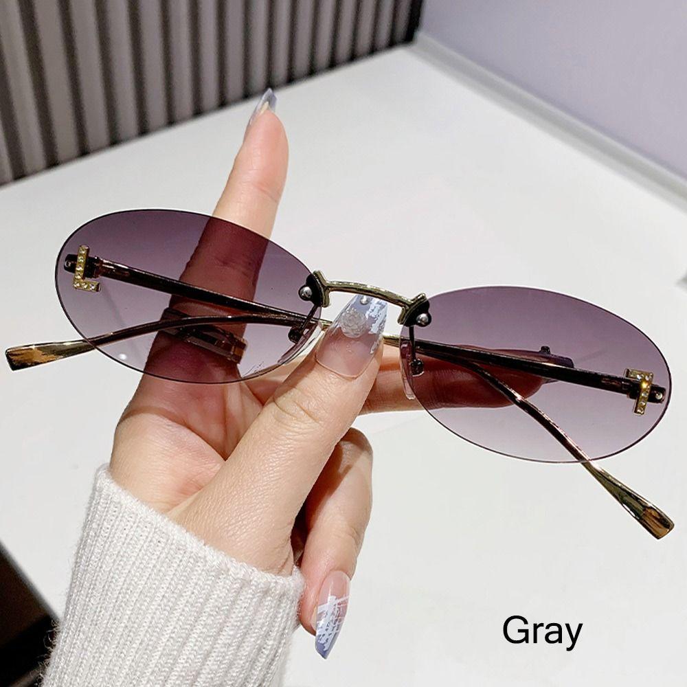 Modische ovale Sonnenbrille für Damen, Luxusqualität, Buchstabendekor, Sonnenbrille, trendige randlose Katzenaugen-Brille, UV400-Schutz, Metall