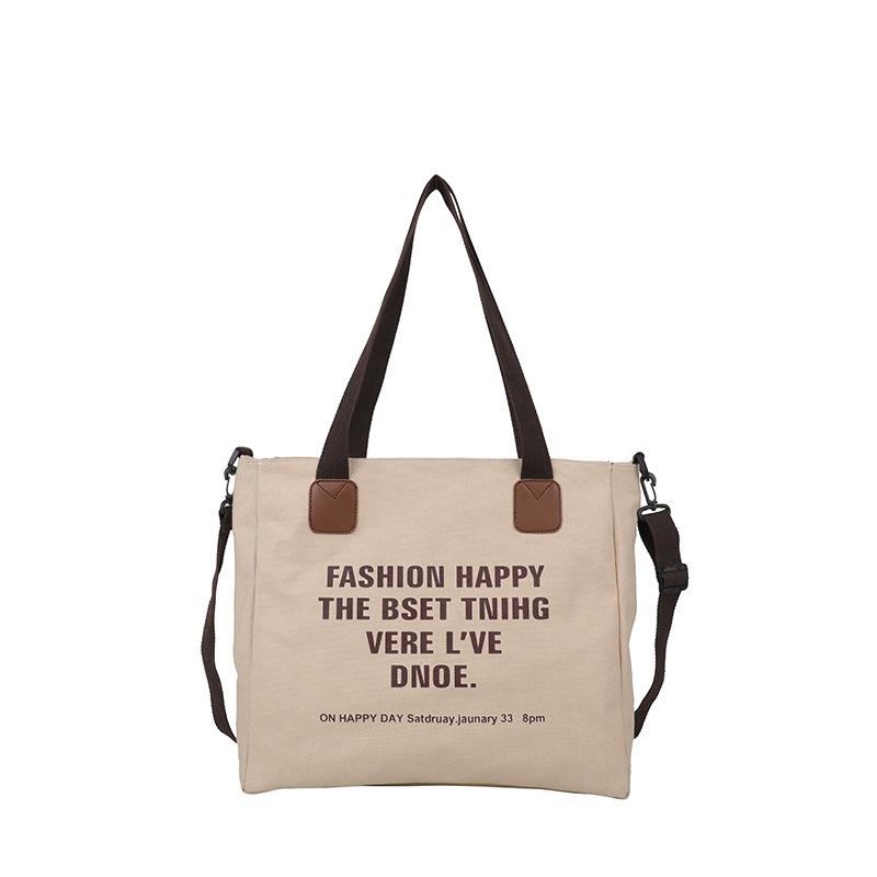 Simple canvas large-capacity casual bag women's 2025 new lazy style single shoulder fashion printed letter tote bag