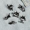 Playful Black Cat Brooch with Knife Design – Unique Animal Accessory