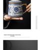 Blue and White Ceramic Office Mug with Tea and Water Separation, Large Capacity.