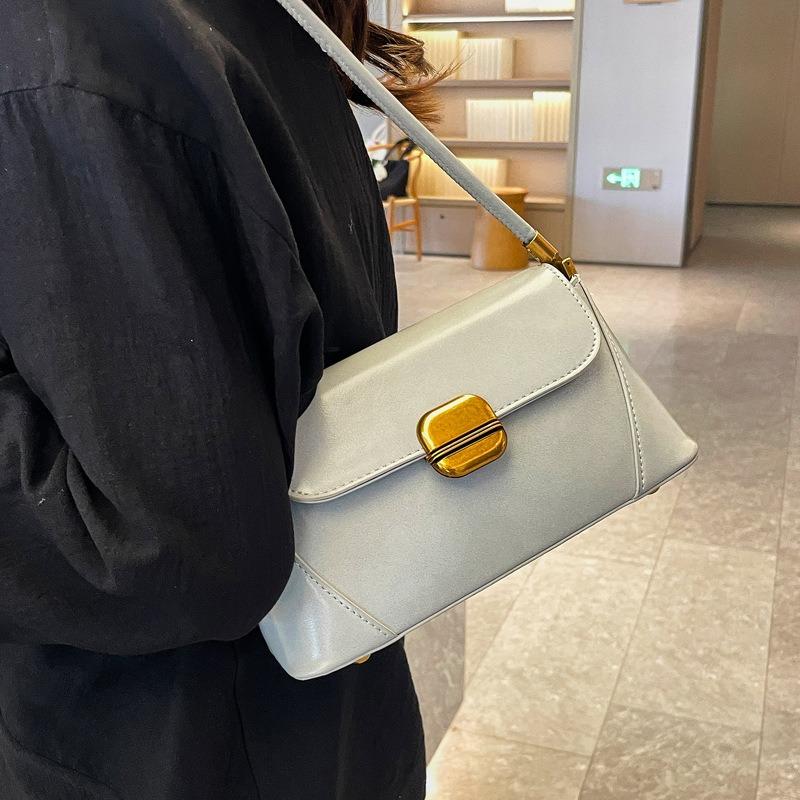 Design sense niche bag women's new high-end texture underarm baguette bag versatile shoulder bag