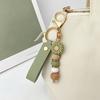 Aesthetic Key Ring Silicone Flower Keychain with Faux Leather Wristlet, Car Lanyard Pendant, Handbag Backpack Charm Wood Beads Bead Wristlet