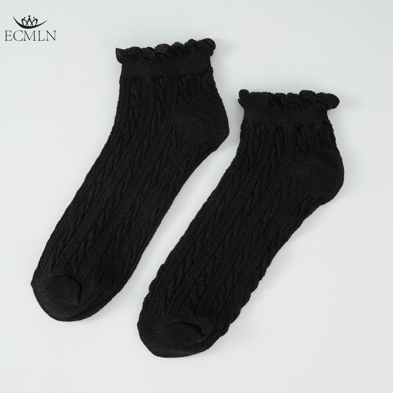 Chaussettes mignonnes respirantes à la cheville pour femmes Chaussettes solides Chaussettes décontractées à volants pour femmes Chaussettes d'équipage respirantes