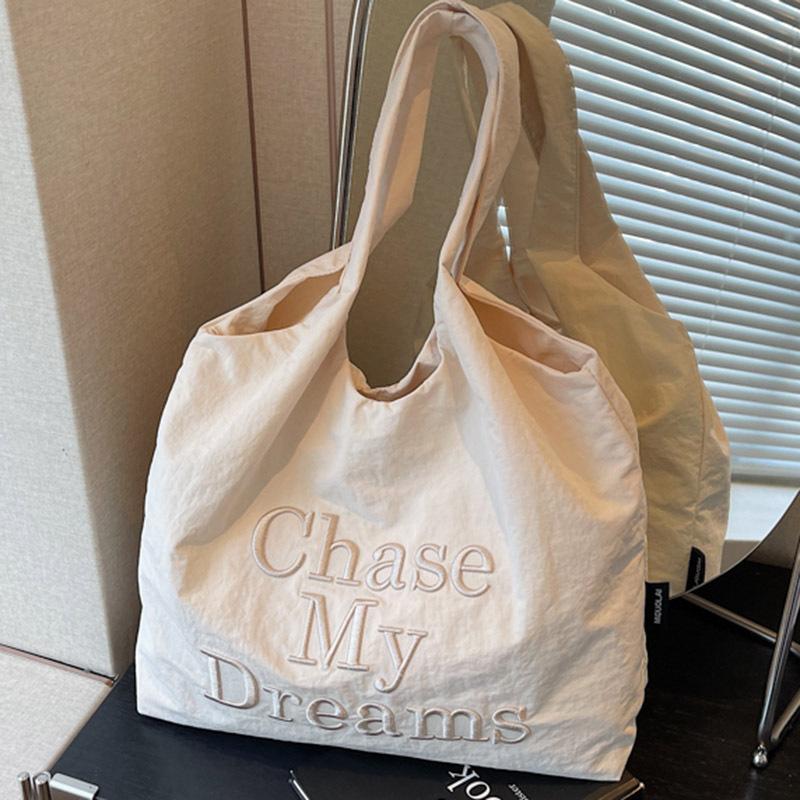 Casual lazy wind large capacity armpit bag women's summer new letter embroidered tote canvas bag