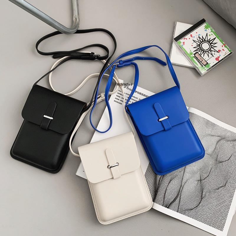 Versatile Vertical Crossbody Bag: Compact Single Compartment