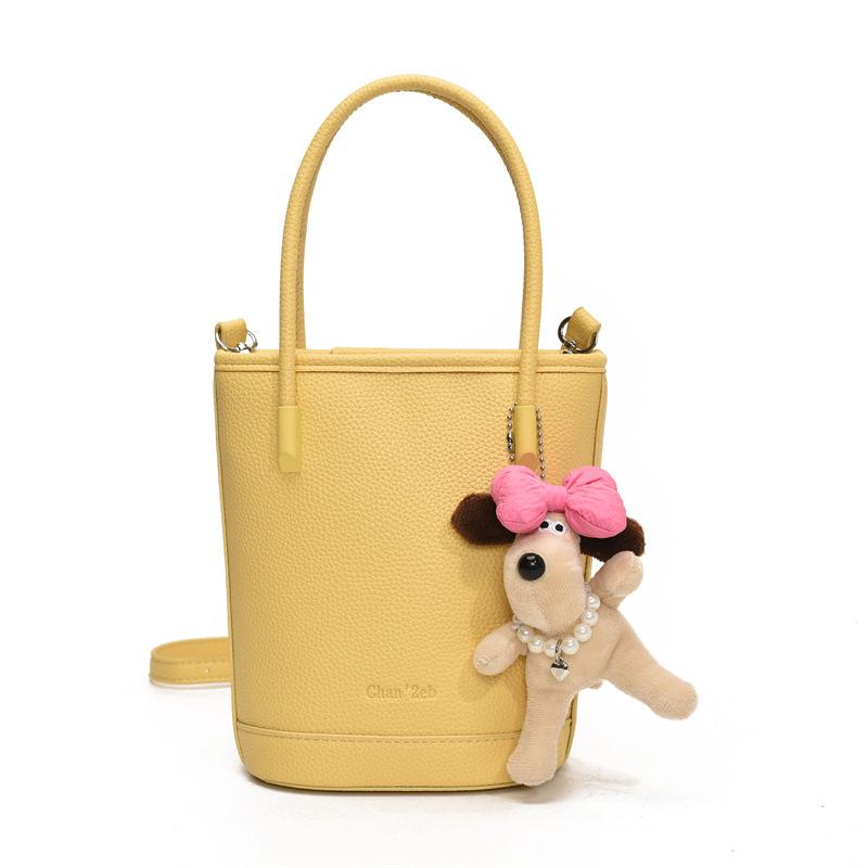 This year's popular niche simple dopamine lychee pattern portable bucket bag women's versatile casual messenger mobile phone bag