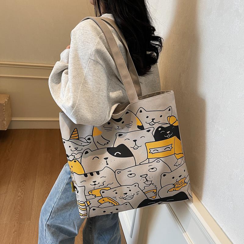 Casual Cartoon Large-capacity Canvas Bag Women's New Fashion Shoulder Bag Versatile Class Commuter Bag