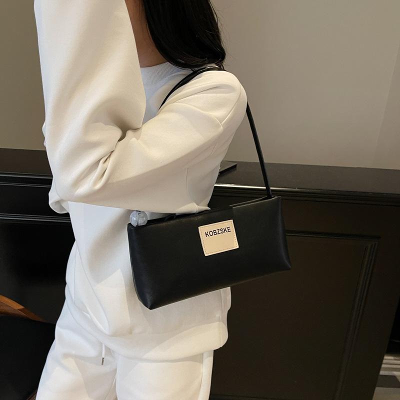 

Hand carry small square bag spring and summer new niche fashion shoulder bag 2025 commuter shoulder underarm bag 28*8*14 чёрный