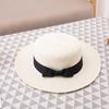 Korean Straw Hat for Women: Retro Flat Top Fedora, Sunshade & Sunscreen, Ideal for Outdoor Summer Beach Travel.