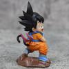 9cm Dragon Ball Kawaii Figur Kindheit Son Goku Hält Puaru Actionfiguren Anime Modell Puppe Sammlung Schreibtisch Dekoration Spielzeug