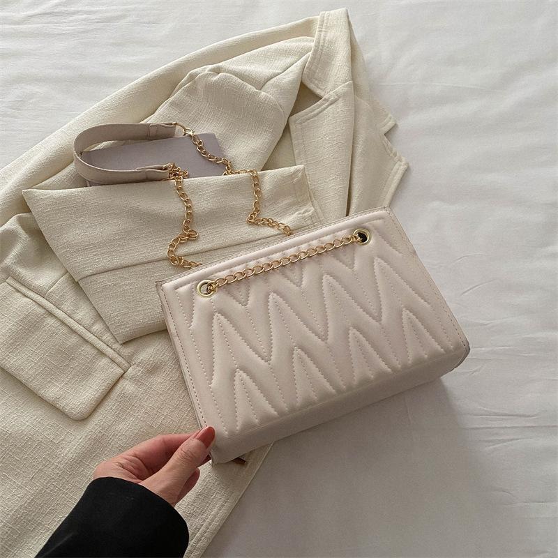 

Women s popular Korean version of chain small bags this year, women s 2025 spring new versatile ins messenger bag small square bag белый