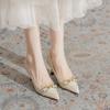 European station spring new high heels thin heel pointed fashion shallow mouth temperament metal buckle commuter single shoes heels