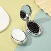 Portable Oval Folding Mirror Comb for Women & Children - Compact Hair Smoothing and Massage Tool