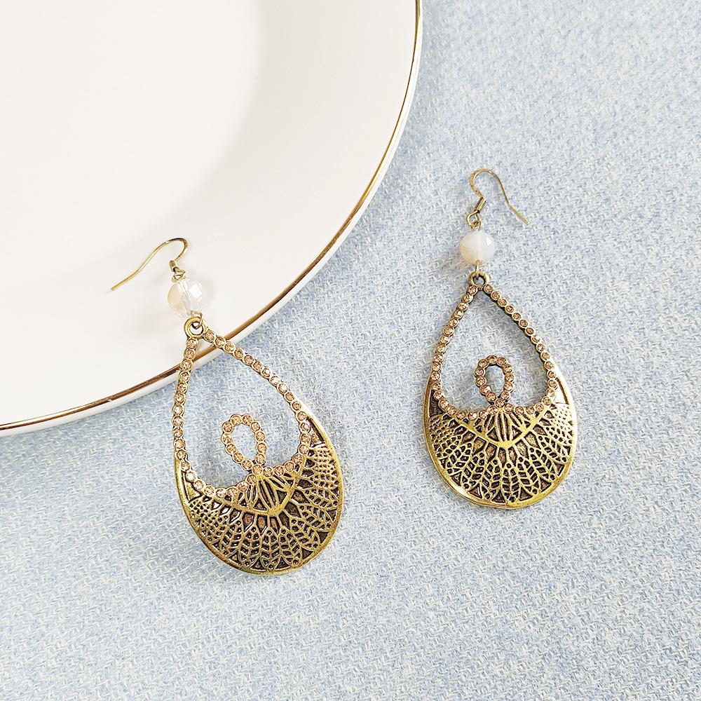 

Minimalist Zinc Alloy Leaf Plaid Vintage Heart Teardrop Earrings for Women