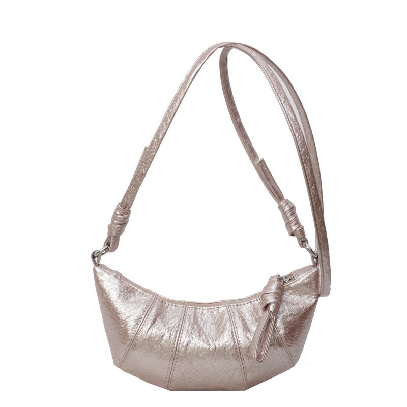 

Fashion high-end sense niche design croissant bag versatile personality trend foreign style solid color PU shoulder messenger bag розовый