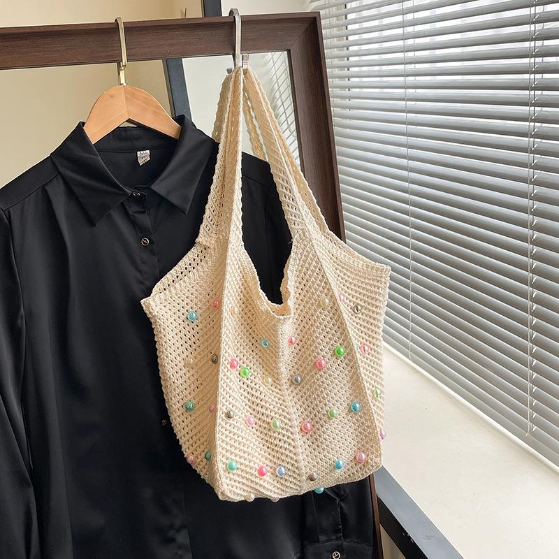 Fashion woven portable tote bag women's bag summer hollow foreign style shoulder bag casual armpit bag