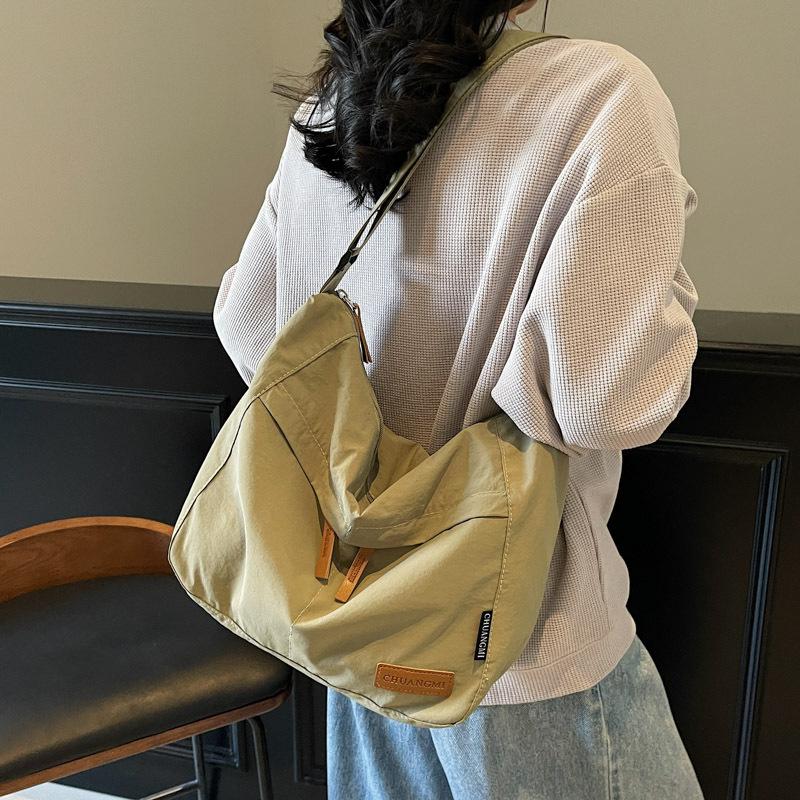 Canvas bag women's large-capacity new versatile shoulder messenger bag cloth bag class commuter tote bag