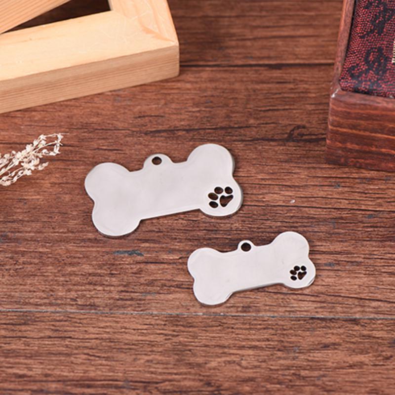 Stainless Steel Hollow Bone Pet Tag with Engraved Dog Paw