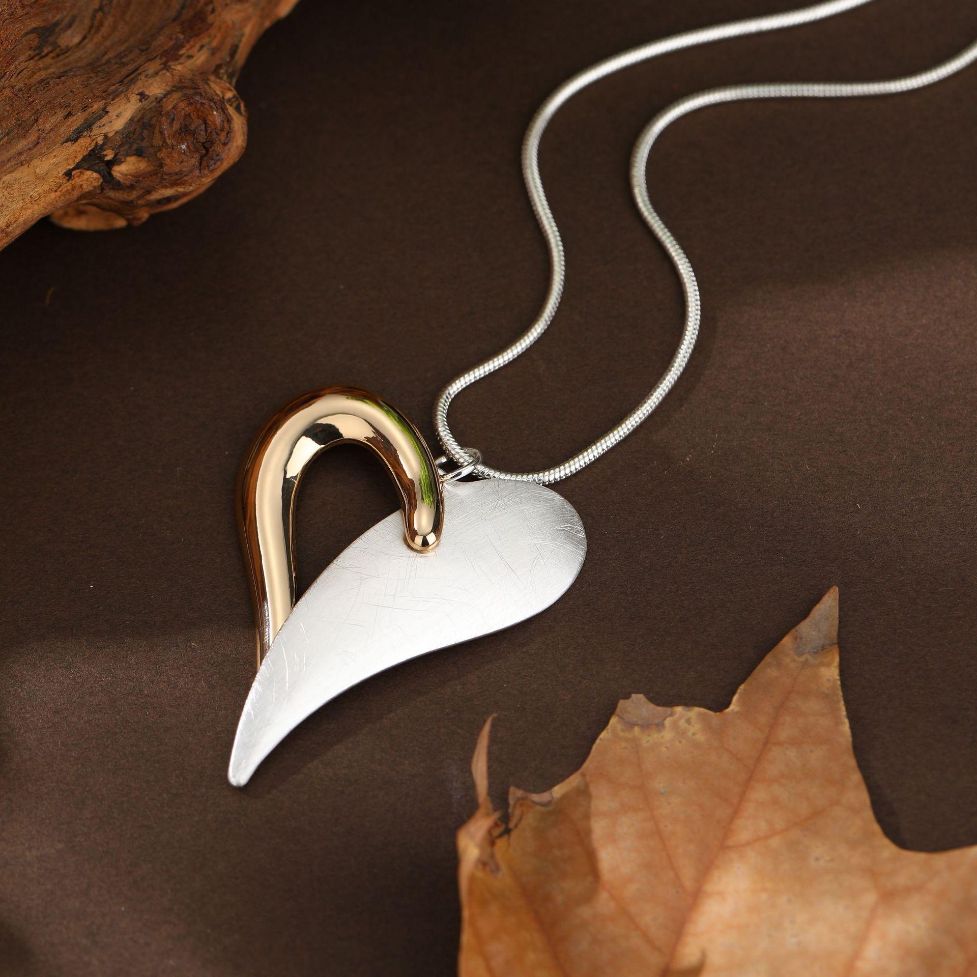 

Two-tone hollow heart pendant necklace срібний