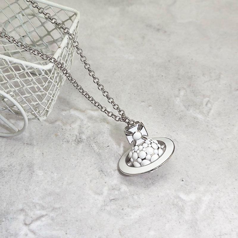 

Empress Dowager 3D Saturn Planet Necklace: Women s Versatile Clavicle Chain with Orb Pendant - Simple Niche Design Choker.