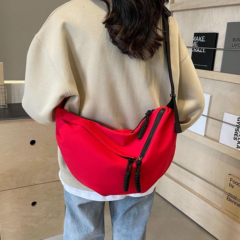Large capacity bag women 2025 new shoulder bag casual Korean version solid color messenger bag trendy student personalized dumpling bag