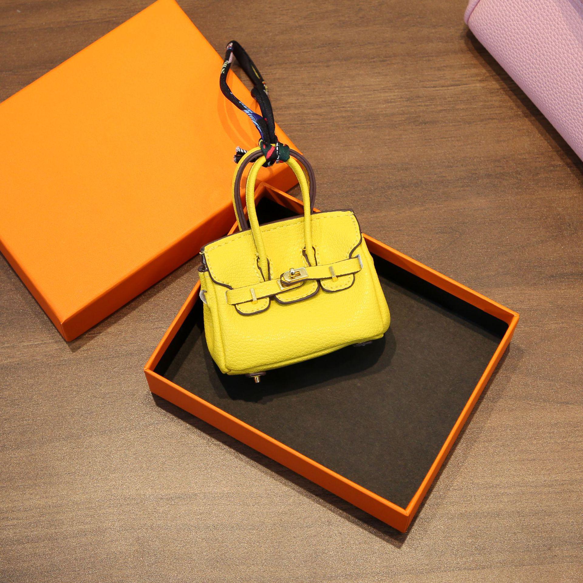 Borsa Pendente Mini Platino H: Elegante Borsa Compatta per Auricolari, Chiavi dell'Auto, Rossetto – Design Creativo e Carino