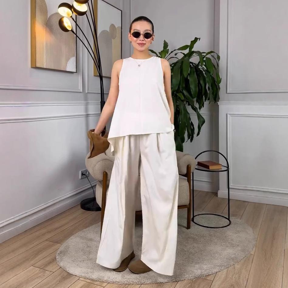 

Женская мода лето 2025: Комплект из топа без рукавов и брюк широкого кроя - Европейский и американский стиль. XS слоновая кость